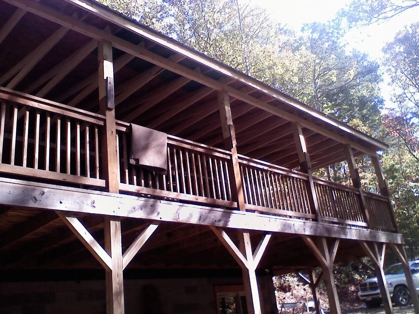 Timber framing under a new elevated porch and deck — Roof Leak Repair in New Weston by Roofing Brothers